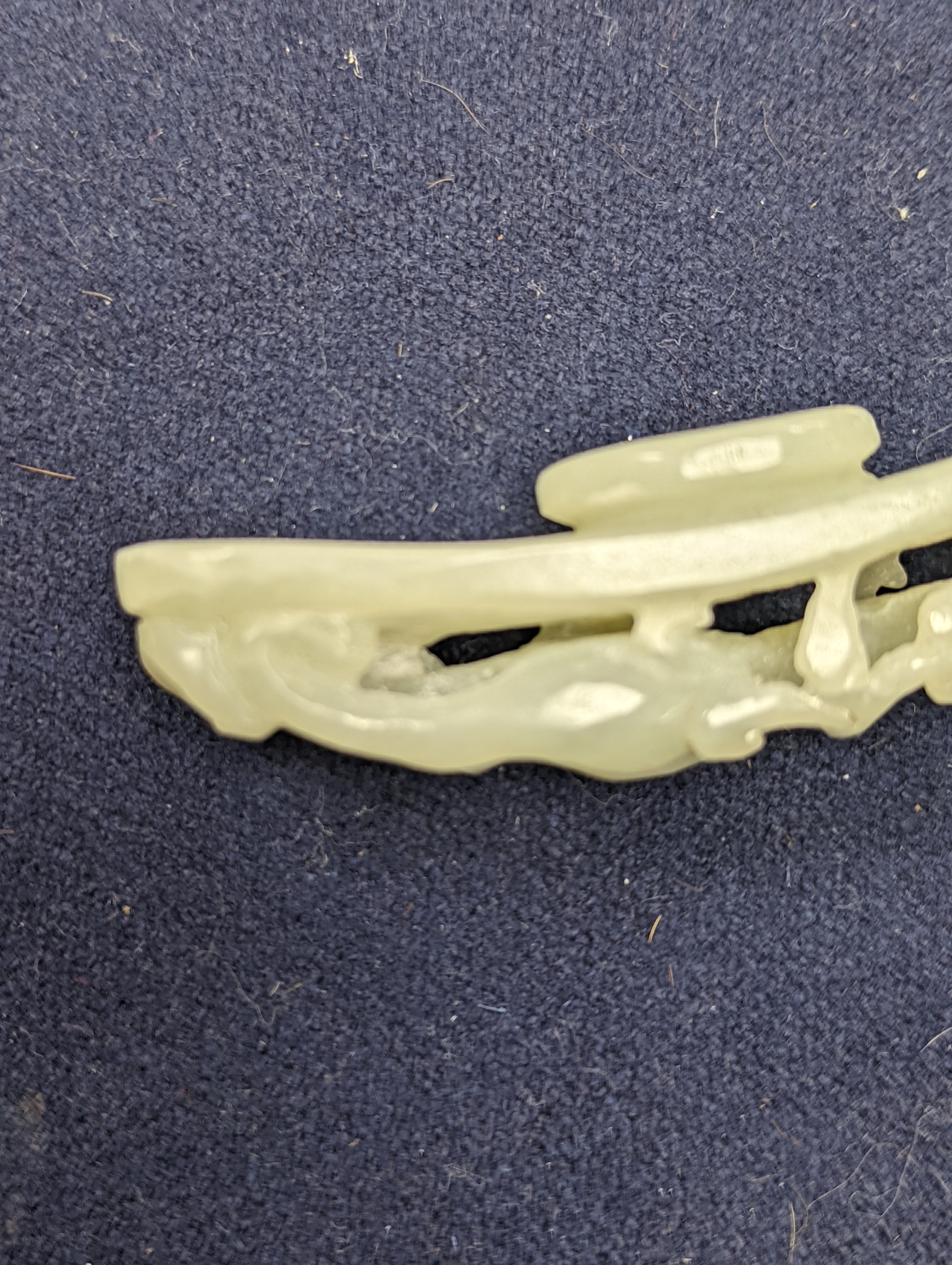 A Chinese jade belt hook, 12.5cm an archer's ring and figure, a stone cup and a glass snuff bottle